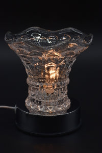 Touch activated electric oil and wax burners